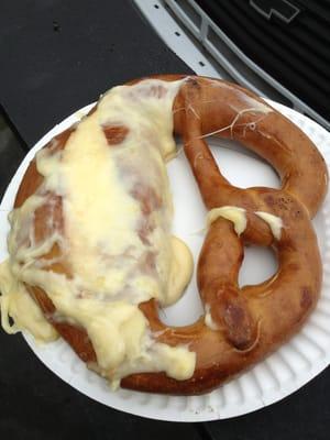 Pretzel smothered with Raclette cheese