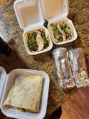 Lengua tacos, chicken quesadillas, and carne asada burritos.. and they don't skimp on the meat like other places.