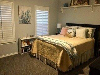 Recarpeted and repainted guest bedroom