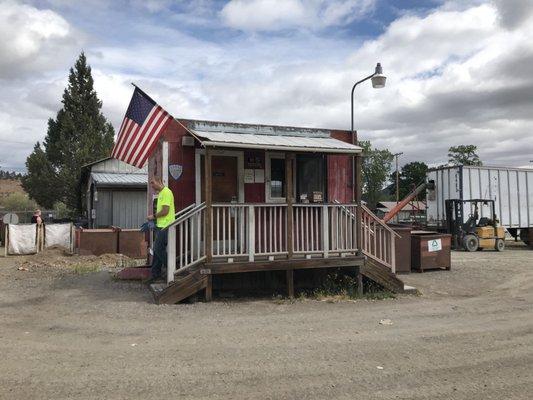 Red shack to drop off ticket and get paid cash/money.