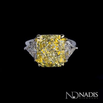 Fancy Yellow Diamond Ring.  9.02 carat Fancy Yellow Radiant Cut Center Diamond.