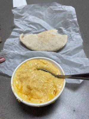 Breakfast pita w/sausage patty and cheese grits