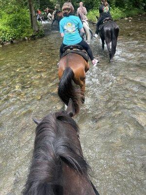 Riding through stream