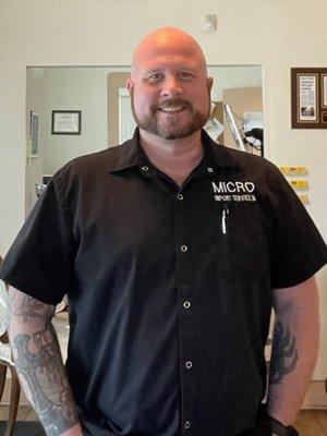 Alan, Micro's General Manager and the smiling face you will see when you walk into the office.