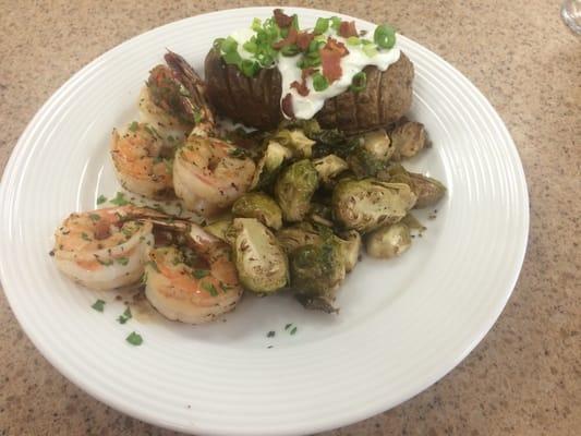 Garlic and herb shrimp w/ shallot Brussels sprouts and loaded baked papas