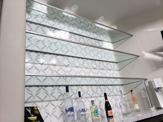 Custom cut 1/2" Clear glass shelving with brushed nickel trim