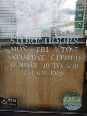 Store hours on door