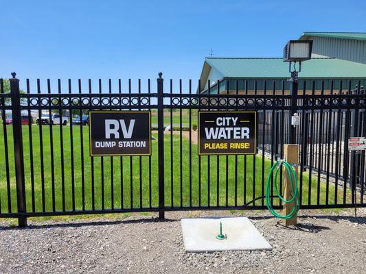 We offer a free RV Dump Station with city water for RV storage customers.