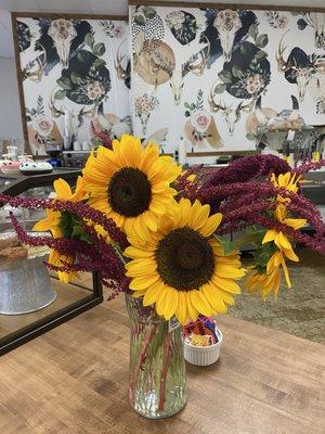 Gorgeous bouquet on the front counter. Love the wallpaper!