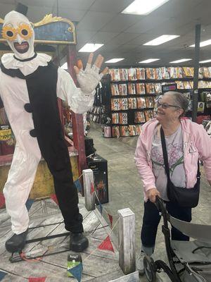 A friend of mine enjoying the animated clown at Spirit Halloween