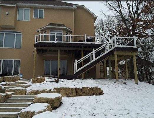 Trex Deck and Handrail in Eagan.  This was enhanced with a catwalk extending the view over the lower pool area.