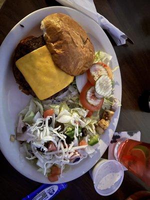 Cheeseburger with side salad