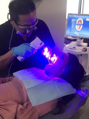 Doctor doing an Oral Cancer screening on the beautiful Julie form Lifestyles by Jules