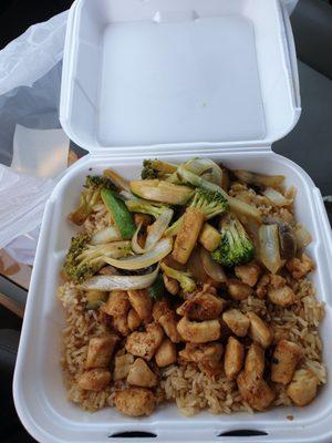 Half Chicken Hibachi,with rice and veggies.