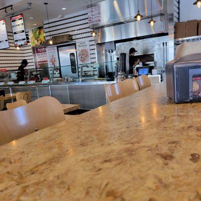 Service counter and staff who seemed more interested in joking with each other than getting orders out.