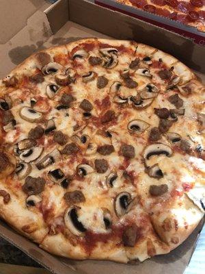 Large with sausage/mushrooms. Special = 2 large/2 topping pizza for only $13.99- DEAL!