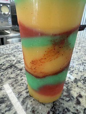 Mango, liquid marijuana ( not marijuana),  & strawberry. Tajín and chamoy.