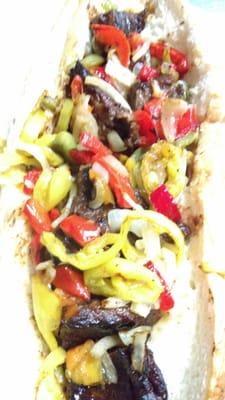 Steak tip sub w peppers, onions and banana hots pepper rings