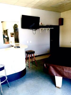 Our waiting room... Flat screen, pool table, a great place to lounge while you're waiting for your vehicle