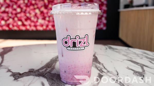 Pink Dragon Drizler w/ a milk, house juice blend, mango puree and dragonfruit pitaya