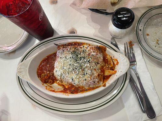 Lasagna which has ground beef, sausage and ricotta.