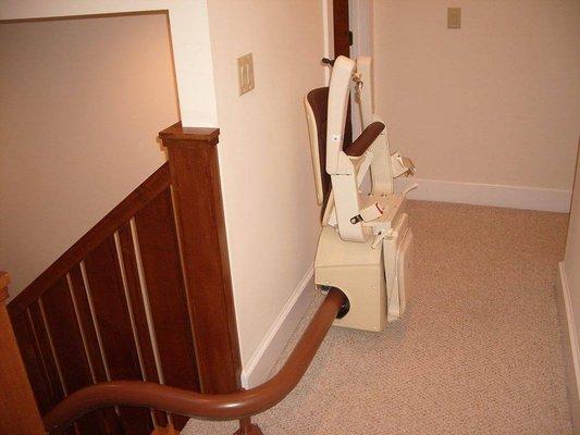 Stair lift chairs easily fold up to leave room and space on stairs and in halls