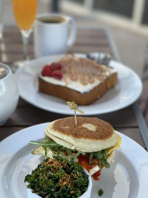 Fancy breakfast sandwich and brioche French toast