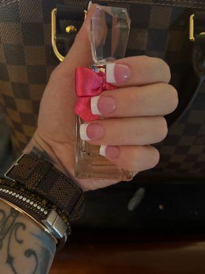 Pink and white french nails.