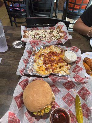 Jalapeño bacon cheese burger and a Korean style Flat bread with loaded fries.