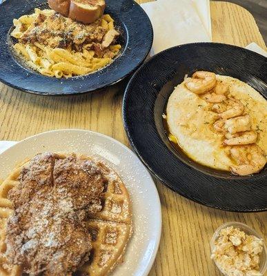 Chicken & waffles, blackened chicken pasta, and shrimp & grits