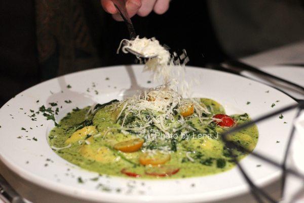 Burrata Ravioli ($26) - spinach, cherry tomato, pesto, parmesan cream sauce