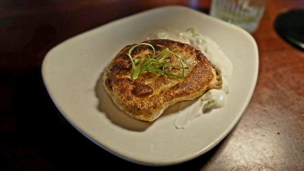 $5 Happy Hour Traditional Polish Pierogies seared in butter served with scallion sour cream