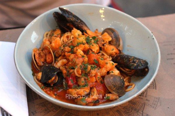 Sapori di Mare ($30) Spaghetti, clams, mussels, langoustine, shrimp, cherry tomatoes, light white wine tomato sauce.