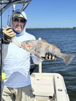 Our friend with one of the fish he caught.