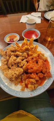 Sweet and sour chicken, sesame chicken, crab puffs