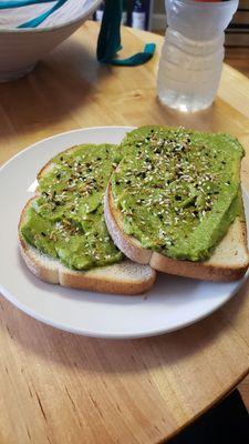 Avocado toast on sourdough bread w/ everything seasoning