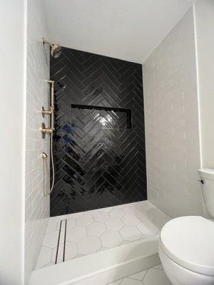 White hex shower floor tiles