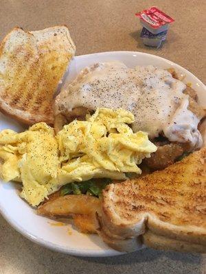 Country fried skillet. Aka, strips of chicken fried steak over potatoes with choice of eggs and toast.