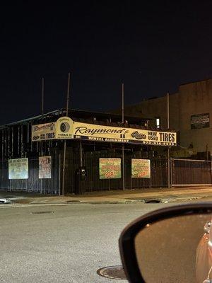 Business store front at night.