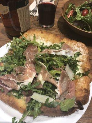 The uniquely fried personal pizza surprisingly light with arugula and prosciutto!