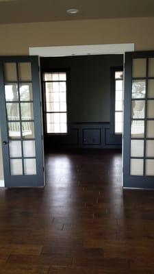 Study after: Added French doors, flooring, and wanes coating