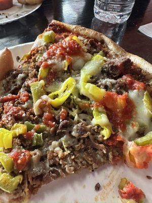 Steak pizza with banana peppers