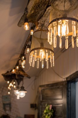 Custom made chandeliers with driftwood and unique shades