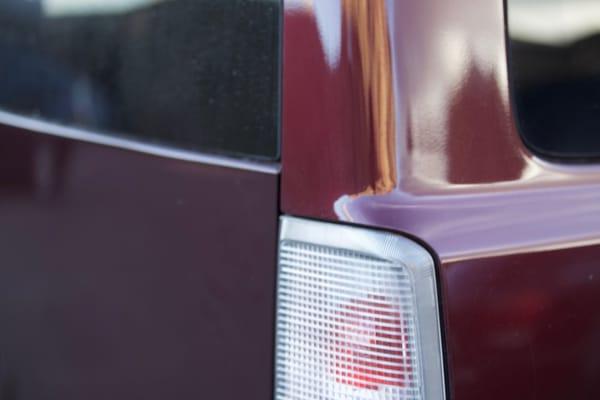 right side of rear liftgate adjacent to right rear quarter panel