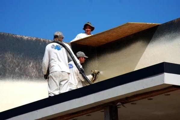 (William Bunfill, Harry Bunfill Jr. Carlos Cobain) Applying Urethane foam safely as a team here.)...