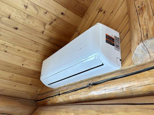 Our log cabin wasn't built with A/C, but these mini-split systems are ductless and work great.