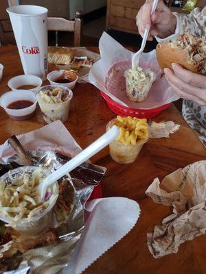 Pulled pork sandwich with a side of coleslaw.