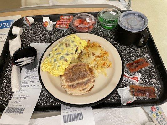 Omlette, hash browns, English muffin- could be more toasted, coffee, lime jello and strawberries that were supposed to be blueberries