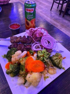 Lamb Ribs Kebab with Steamed Vegetables and peach juice