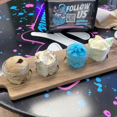 "Flight board" of four ice cream. L to R: chocolate truffle, peanut butter, blue moon, birthday cake